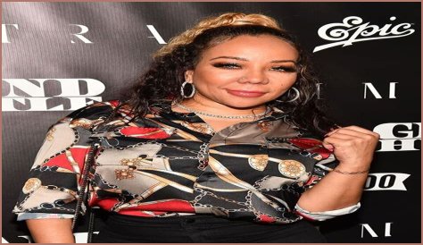  'Family Hustle' Star Tiny Harris Mourns Death of Her 'Brother' Sanchez Holmes and Honors Him with a Marching Band